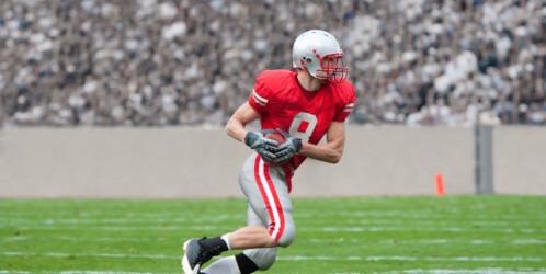 American,football,player,running,upfield