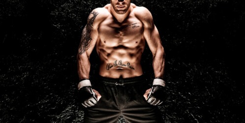Mixed,martial,artist,posing,on,a,black,background.,concept,of