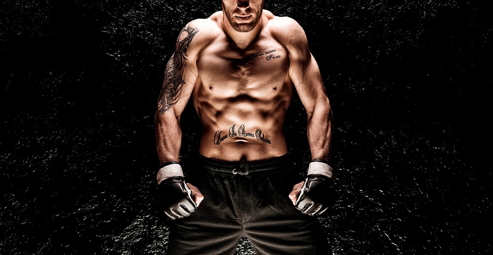 Mixed,martial,artist,posing,on,a,black,background.,concept,of